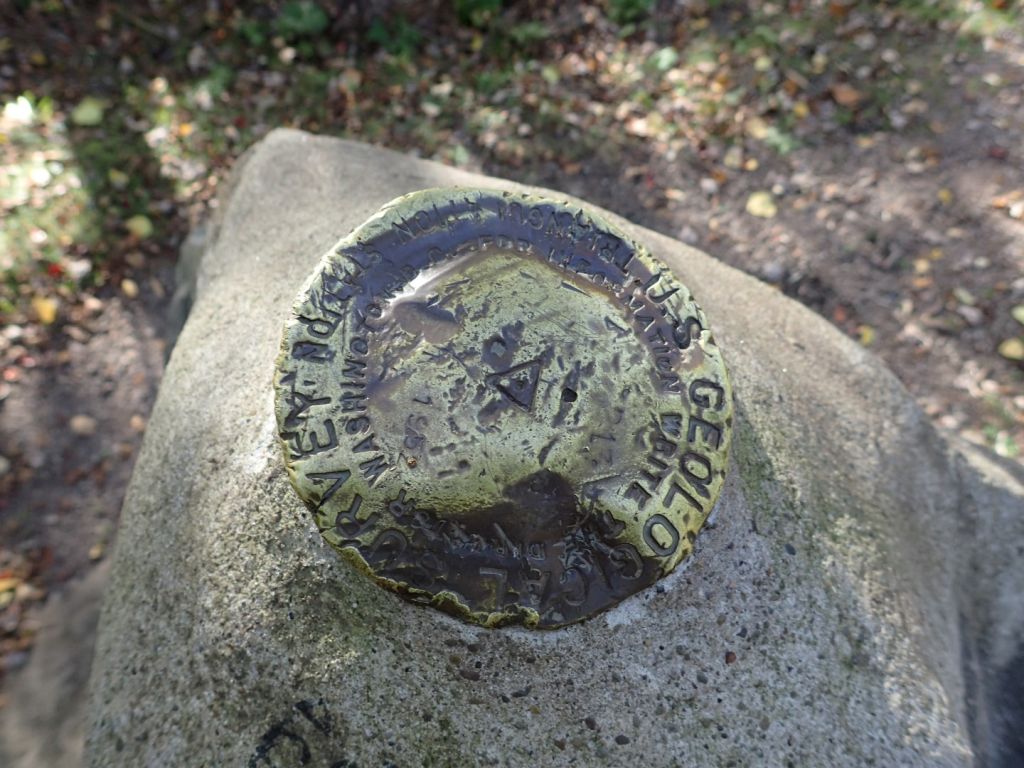 USGS Badge atop stone