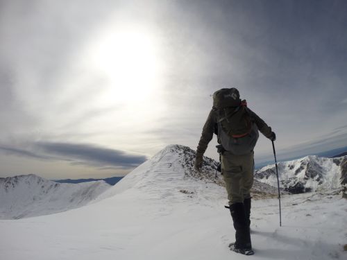 Danger striding powerfully towards the summit, and not postholing!