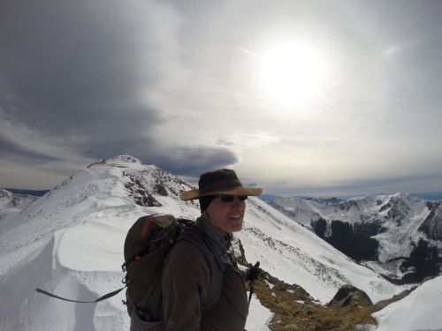 Hiking north along the summit ridge on the descent