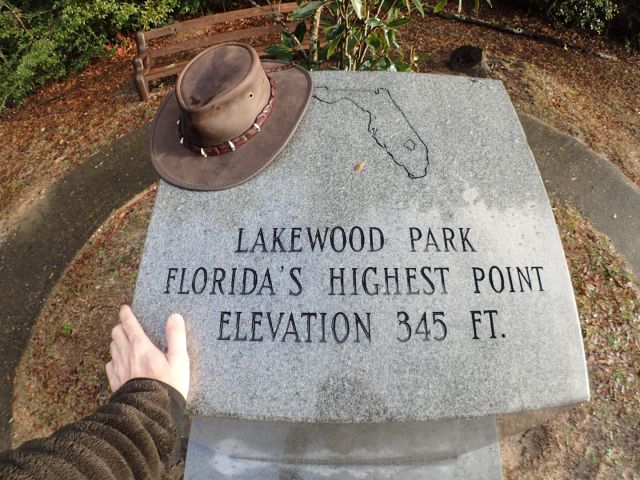 The summit marker is larger than most