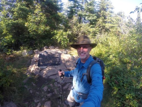 The summit was shrouded by forest, but quiet and peaceful.