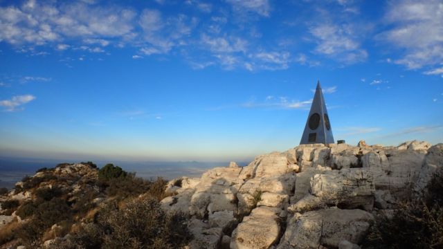 The curious pyramid summit marker, placed there by American Airlines in 1958.